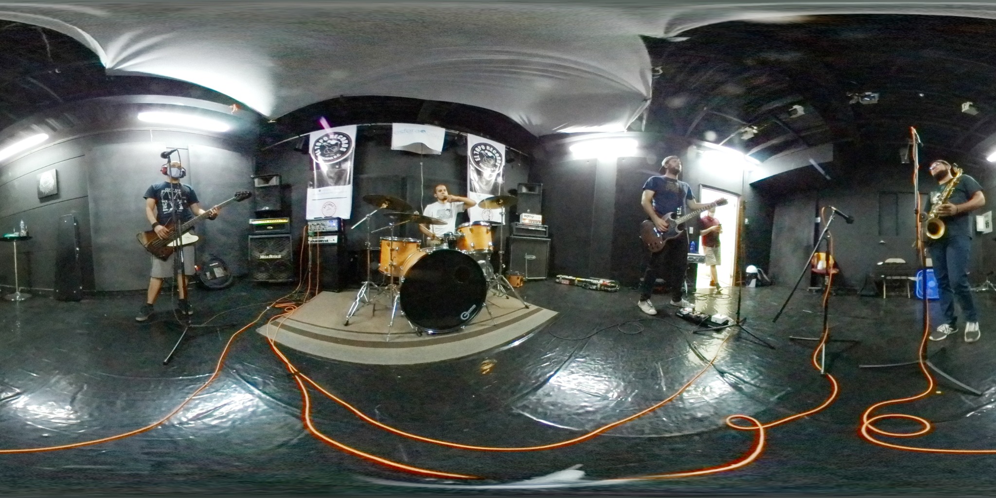 Band rehearsing and recording
