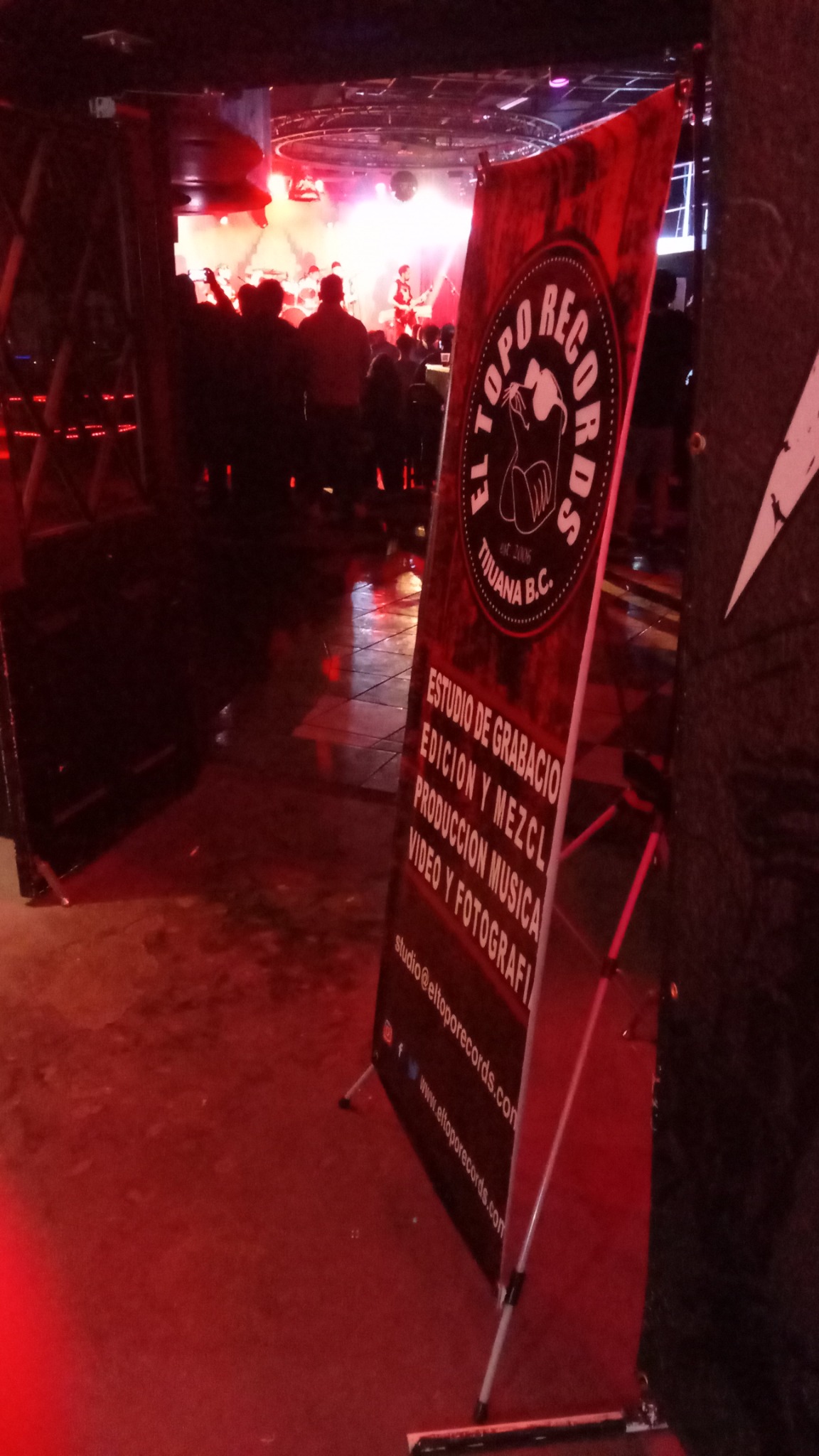 El Topo Records banner at a live event